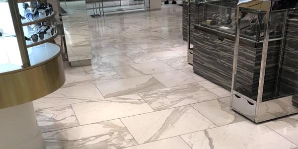 Image of an apartment home with brown marble floor