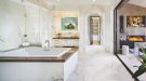 Modern bathroom interior with white marbles and mirrors