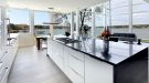 Image of beautiful compact kitchen with gray marble floors